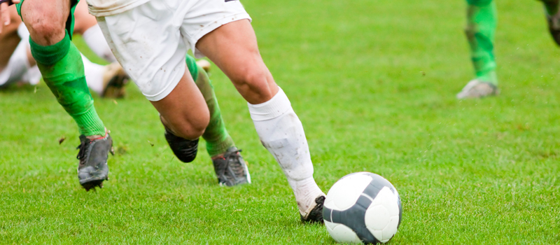 Jogadores de futebol em campo